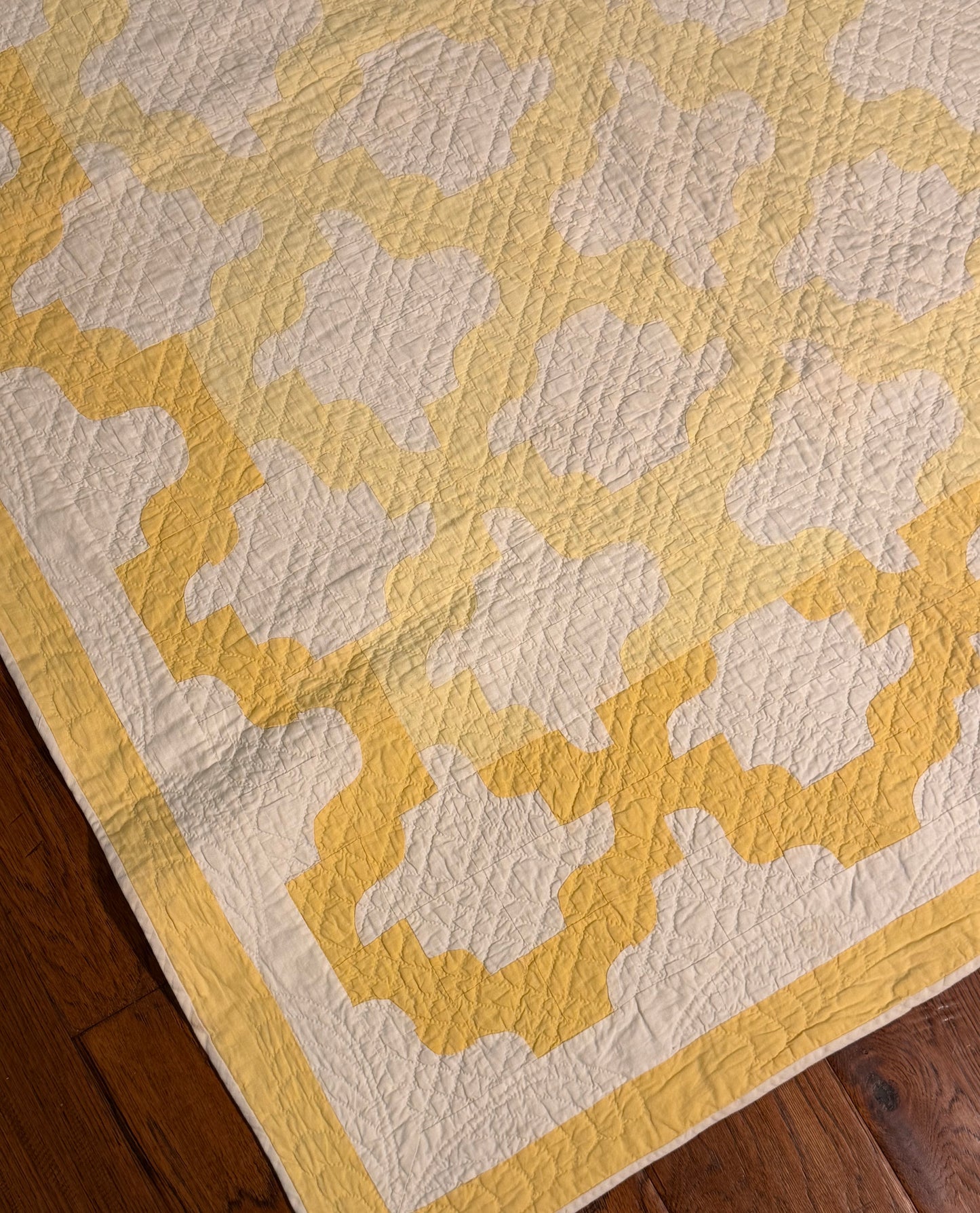 Yellow and White Drunkards Path Crib Quilti