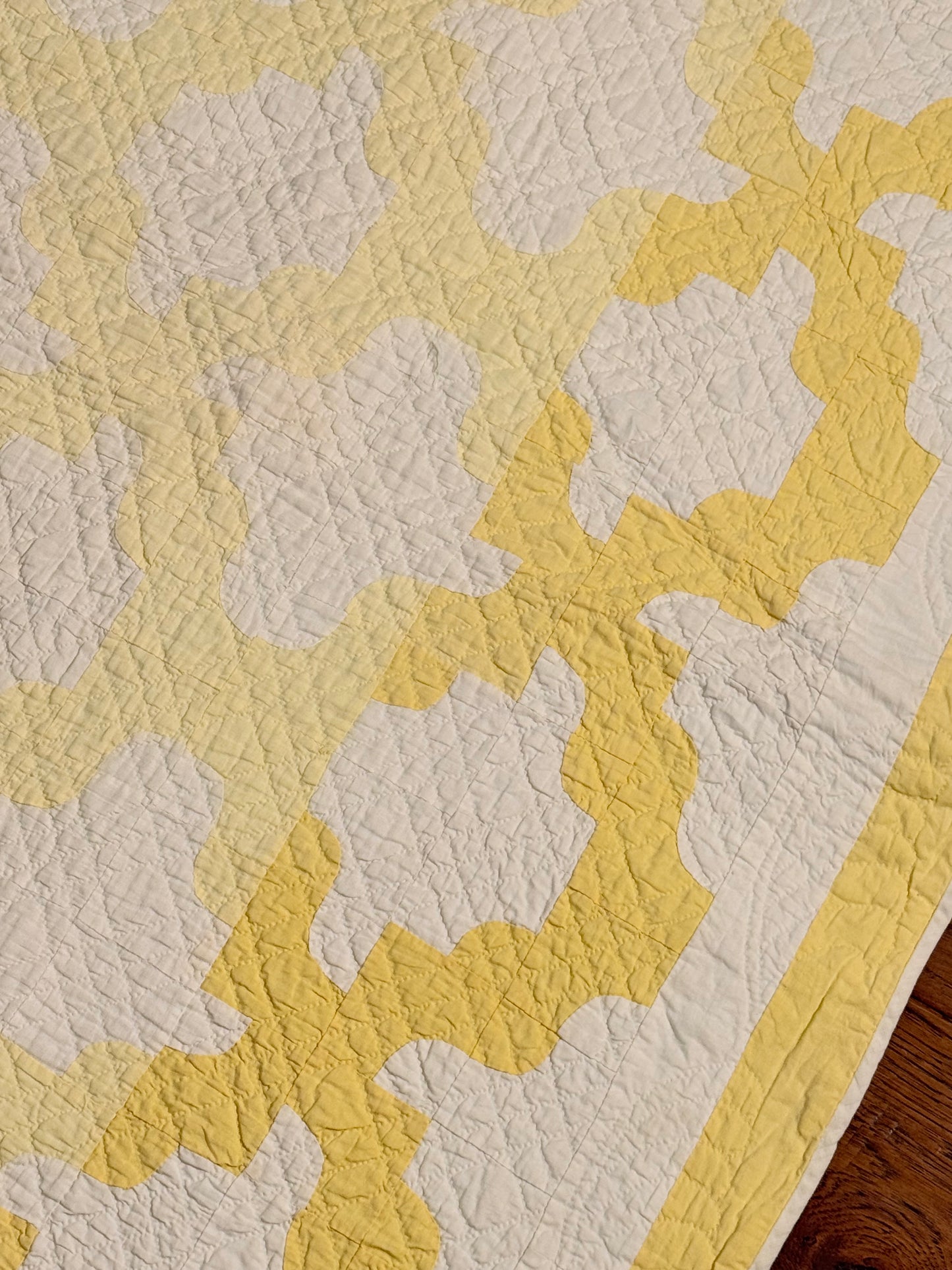Yellow and White Drunkards Path Crib Quilti