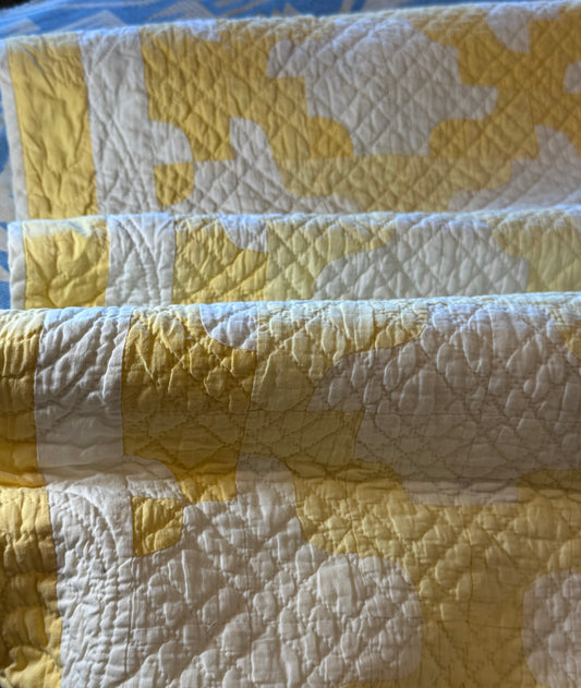 Yellow and White Drunkards Path Crib Quilt