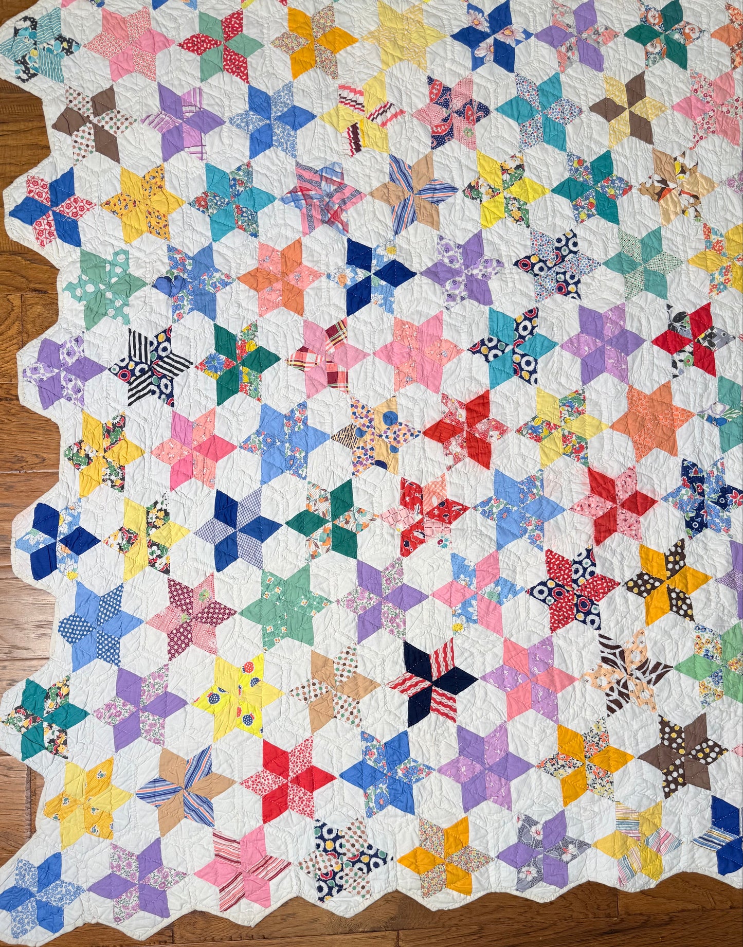 Six Point Hexagonal Scrappy Stars Quilt