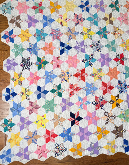 Six Point Hexagonal Scrappy Stars Quilt