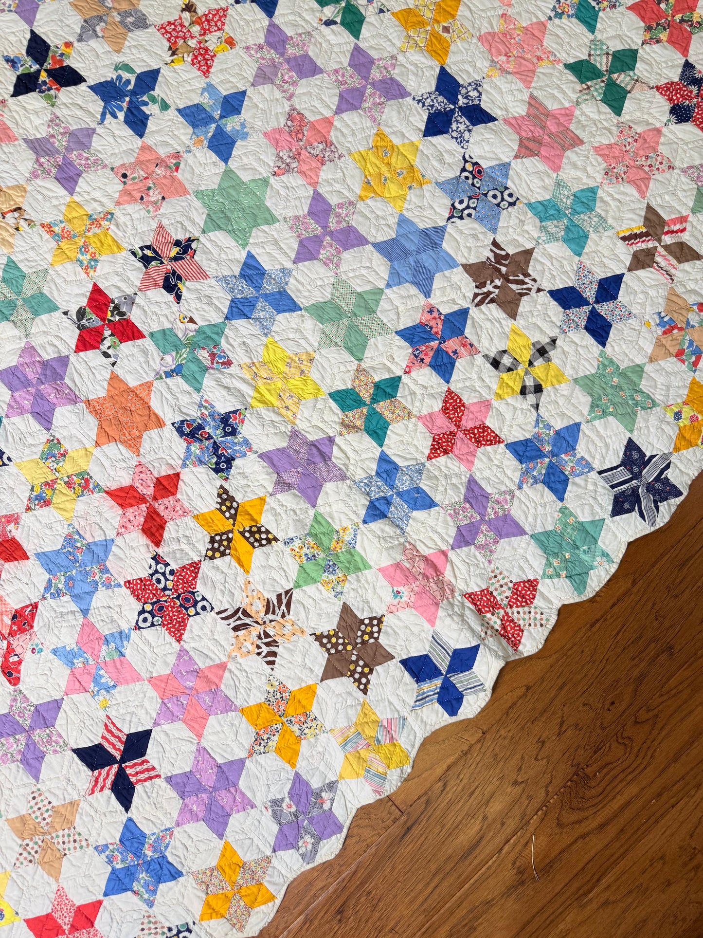 Six Point Hexagonal Scrappy Stars Quilt