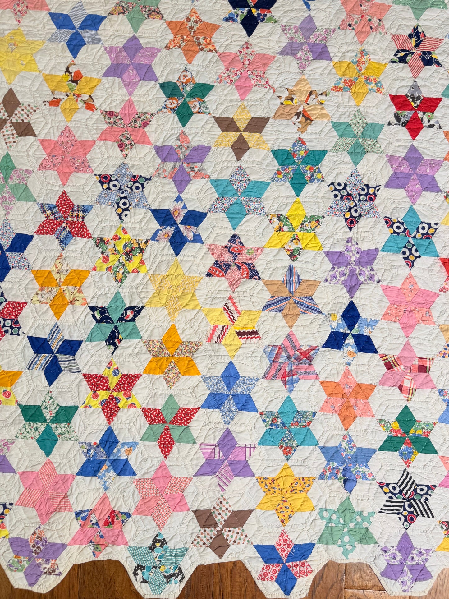 Six Point Hexagonal Scrappy Stars Quilt