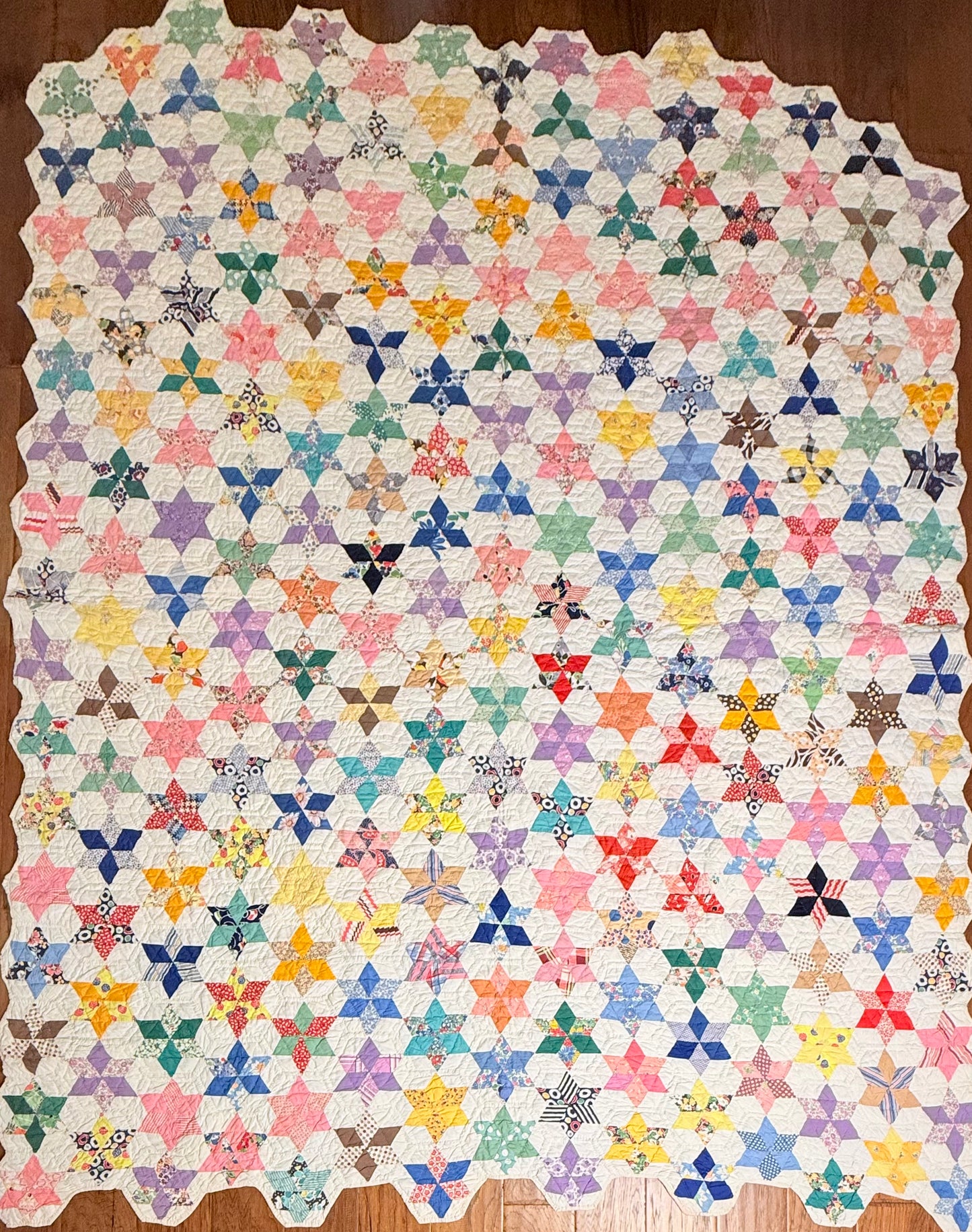 Six Point Hexagonal Scrappy Stars Quilt