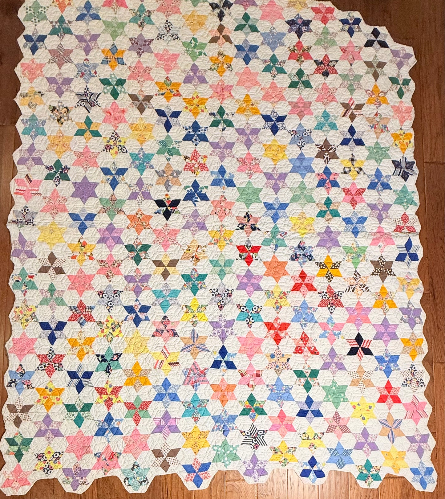 Six Point Hexagonal Scrappy Stars Quilt