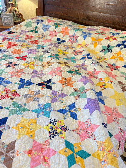 Six Point Hexagonal Scrappy Stars Quilt