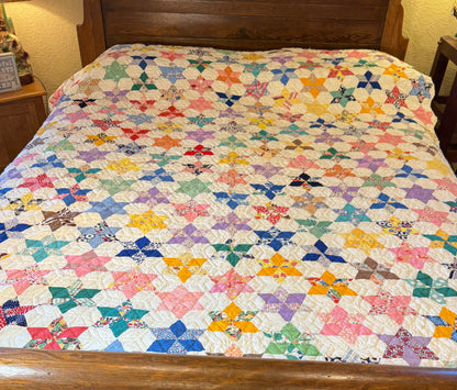 Six Point Hexagonal Scrappy Stars Quilt