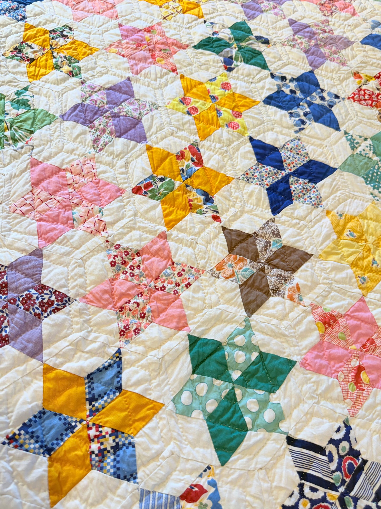 Six Point Hexagonal Scrappy Stars Quilt