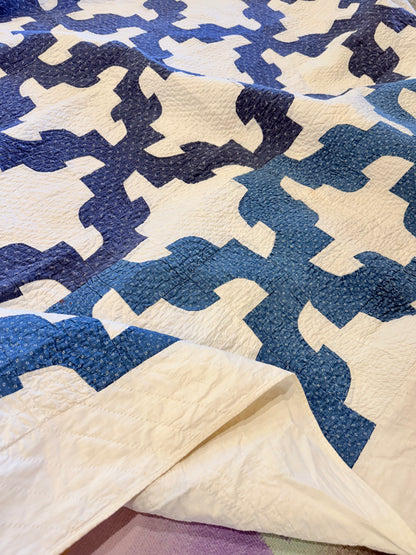 Blue and White Drunkards Path Quilt