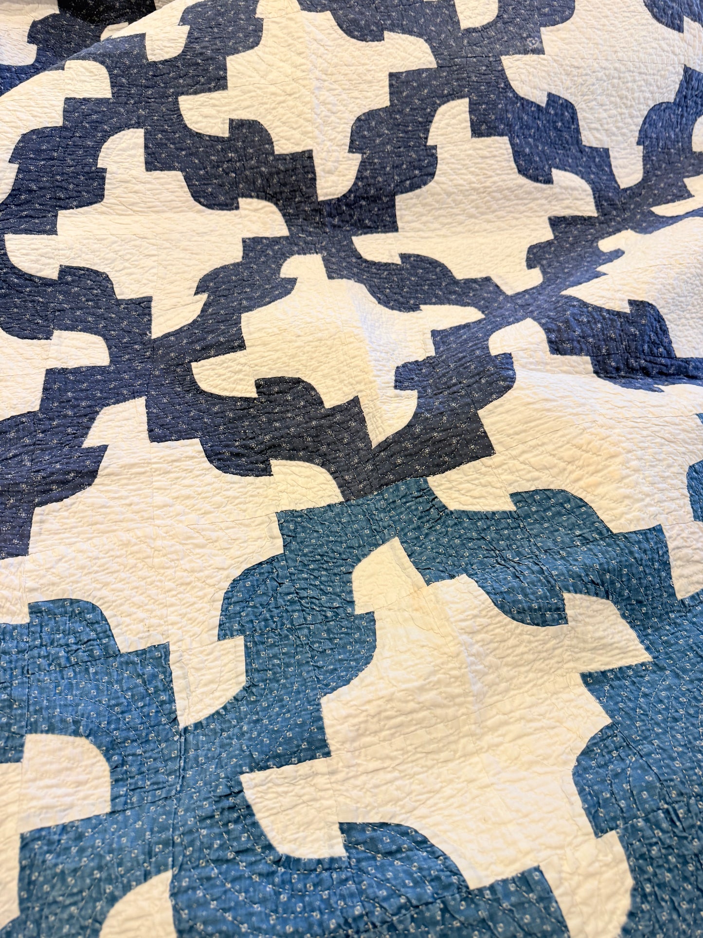 Blue and White Drunkards Path Quilt