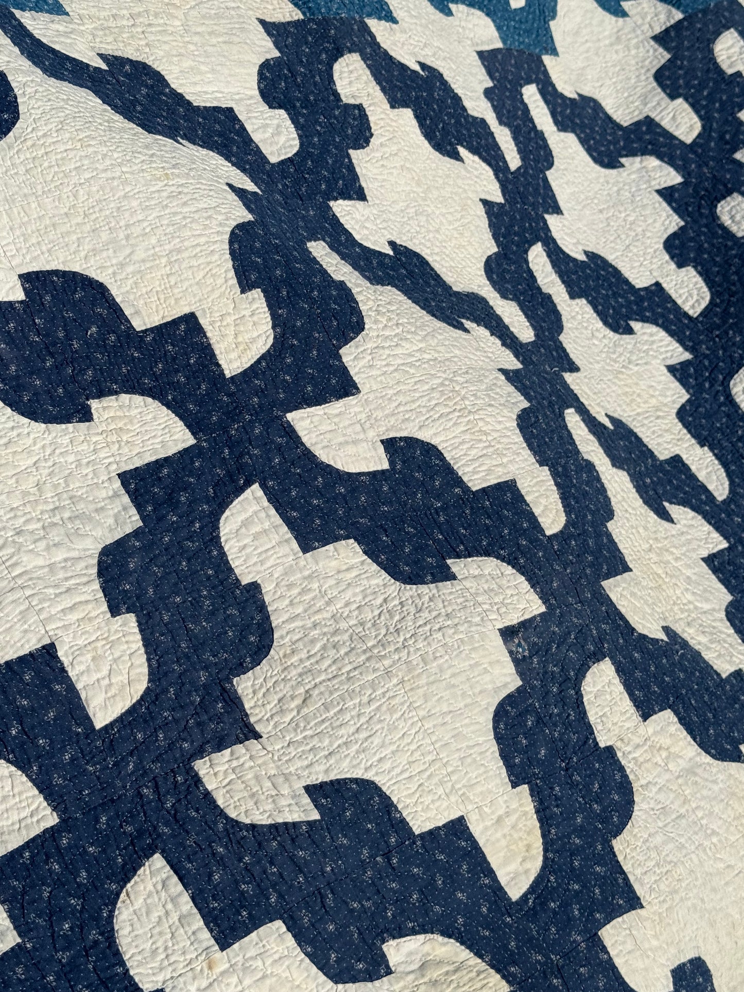 Blue and White Drunkards Path Quilt