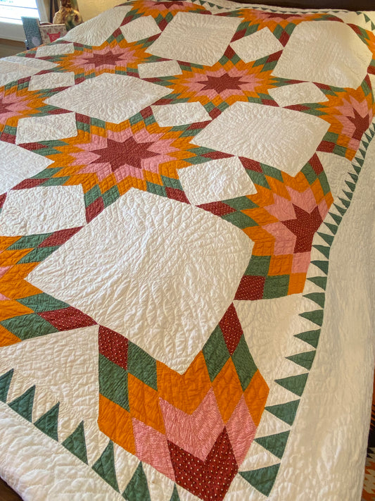 Touching 8 Point Stars Quilt with Sawtooth Border