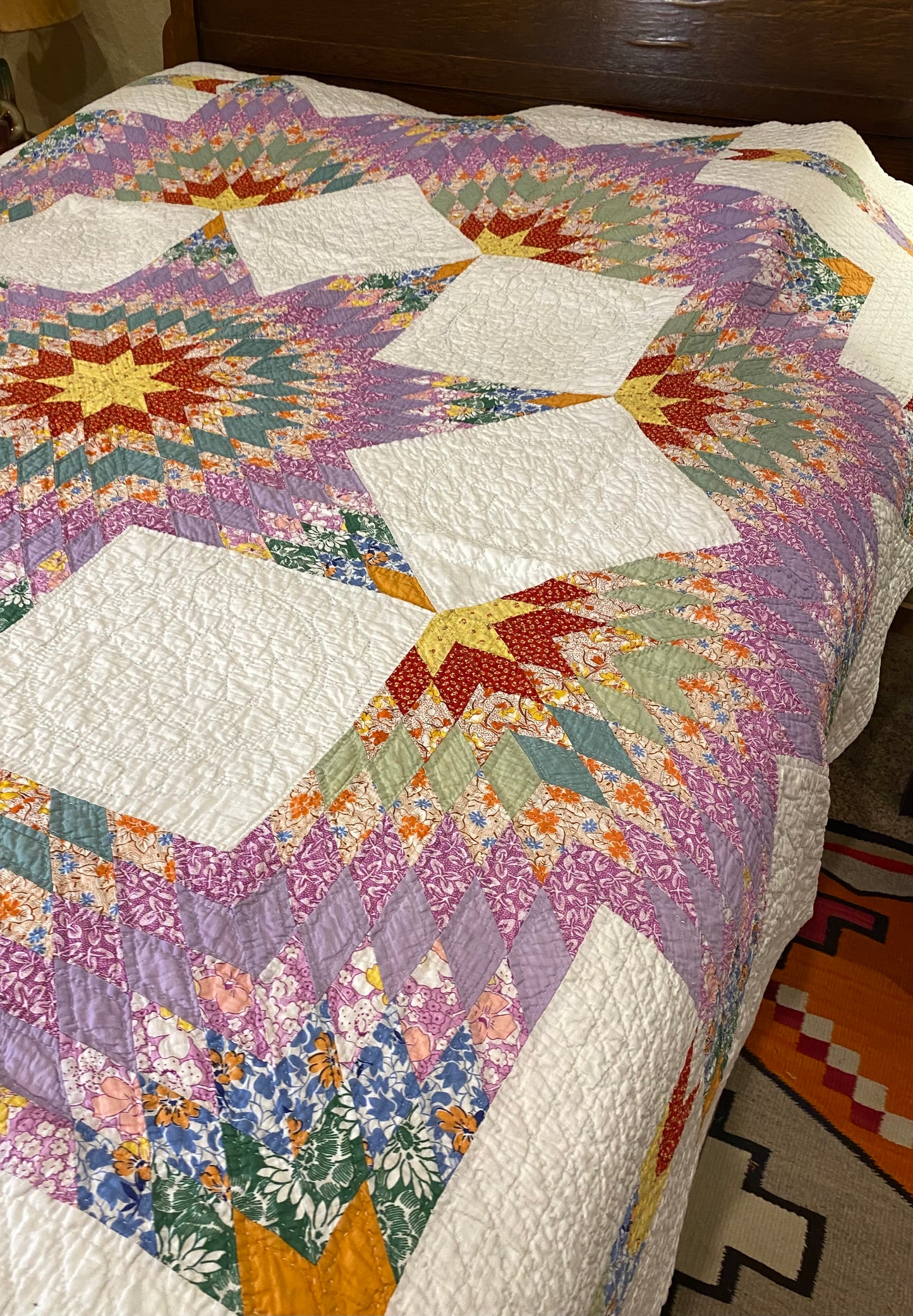 Unique Broken Star Quilt with Corner Framed Borders