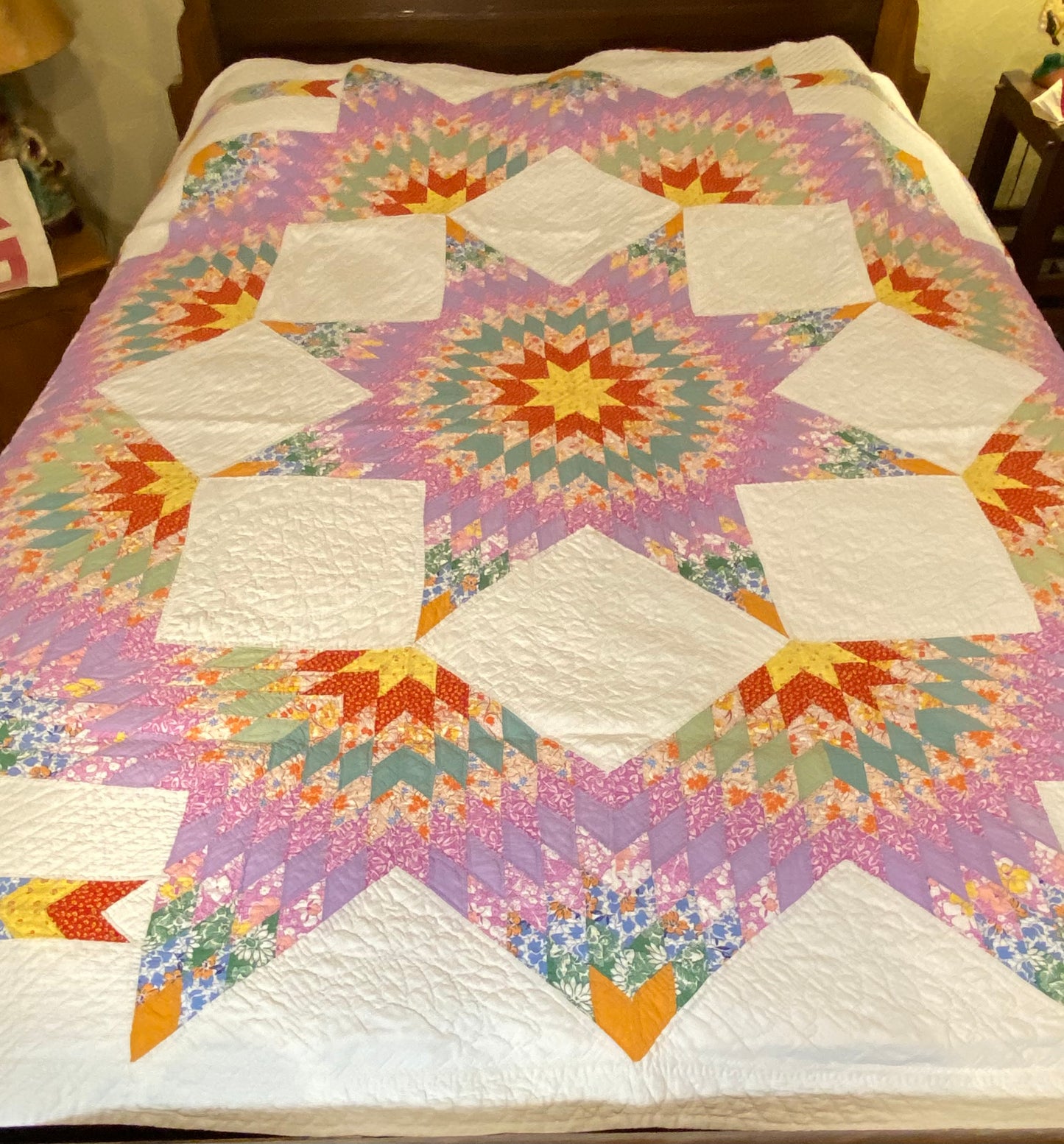 Unique Broken Star Quilt with Corner Framed Borders