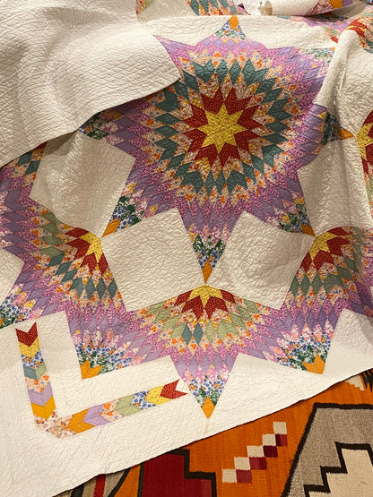 Unique Broken Star Quilt with Corner Framed Borders