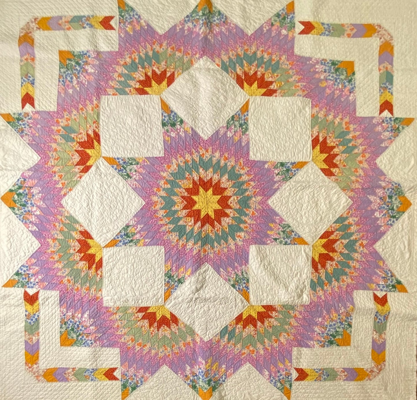 Unique Broken Star Quilt with Corner Framed Borders