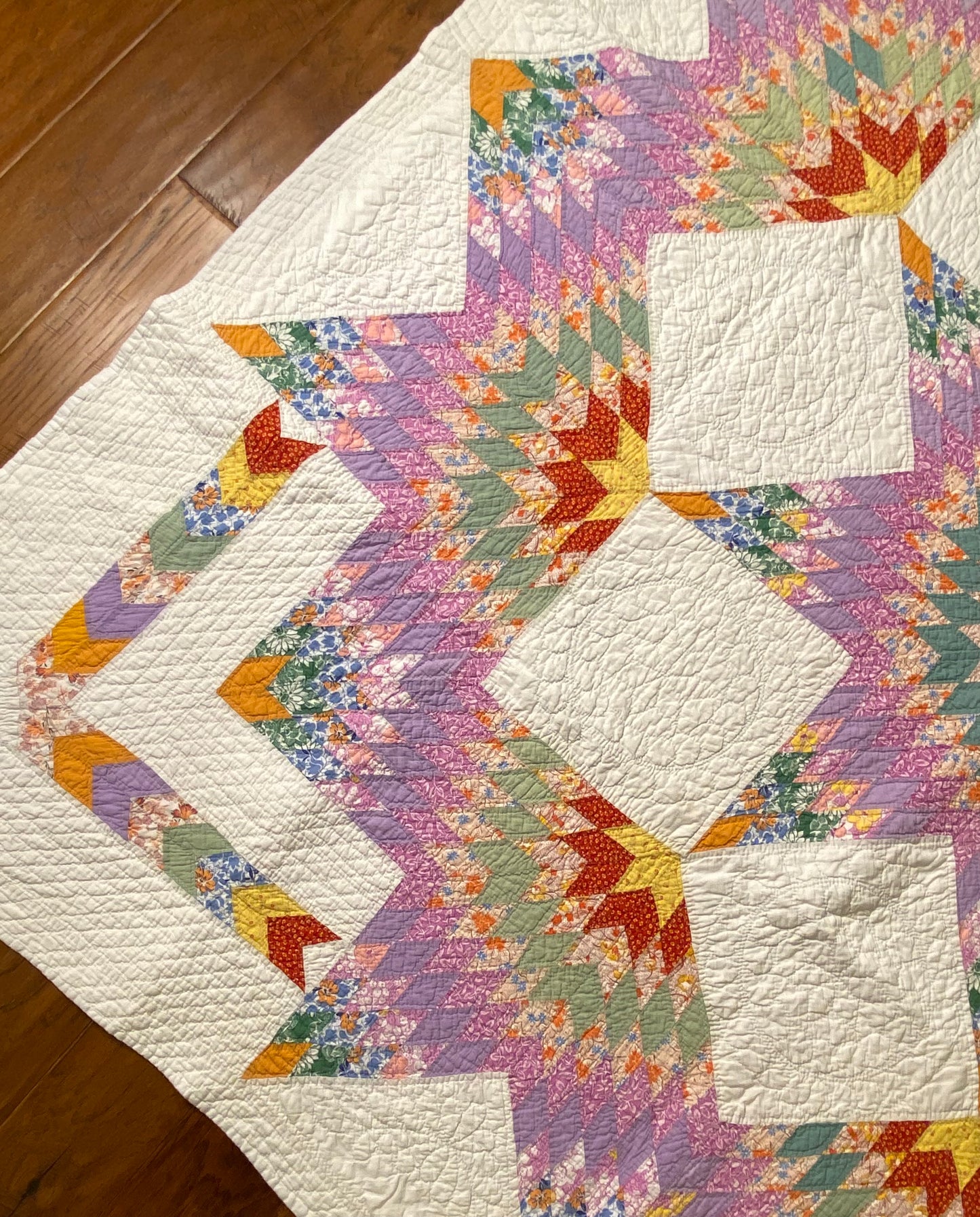 Unique Broken Star Quilt with Corner Framed Borders