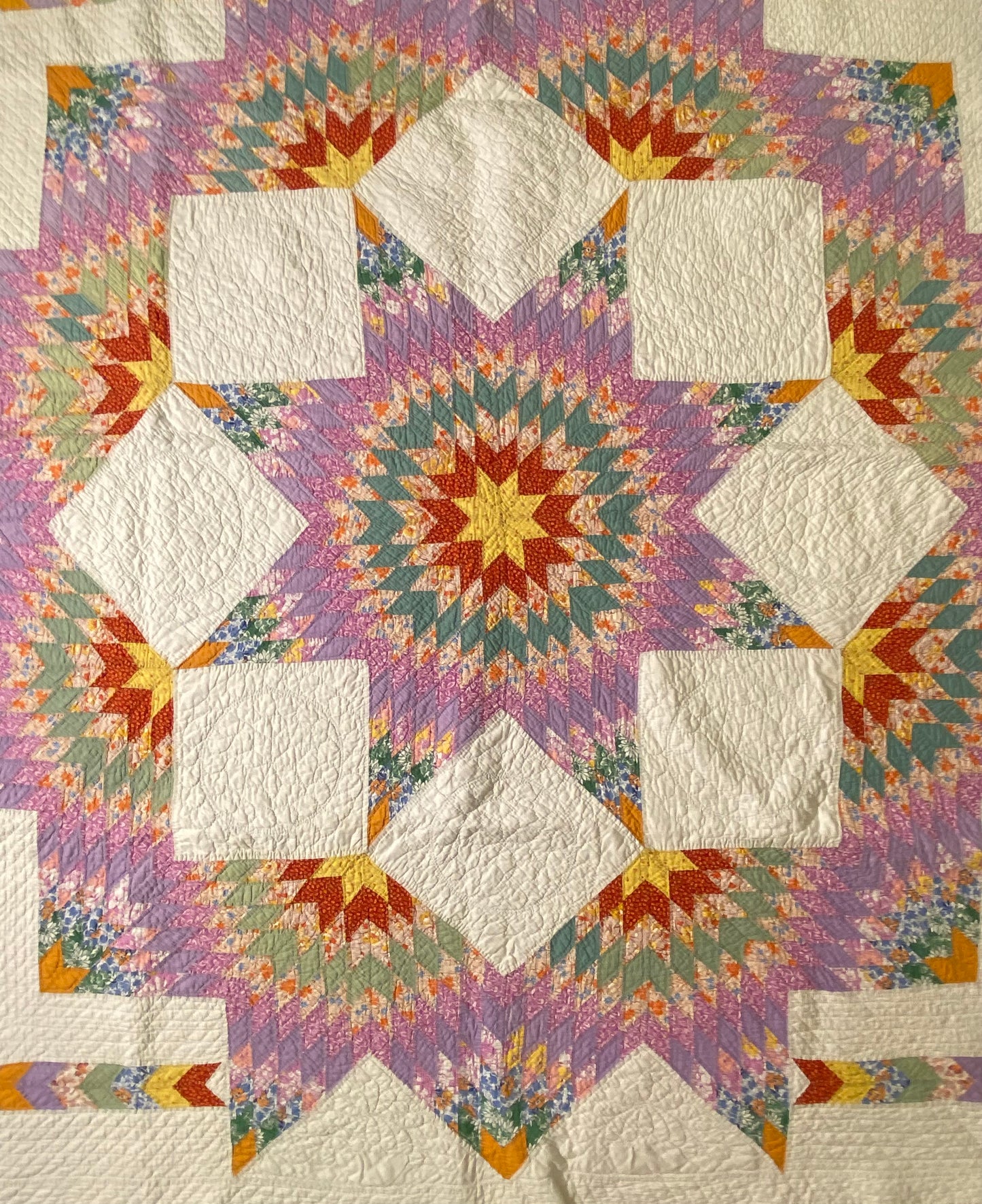 Unique Broken Star Quilt with Corner Framed Borders