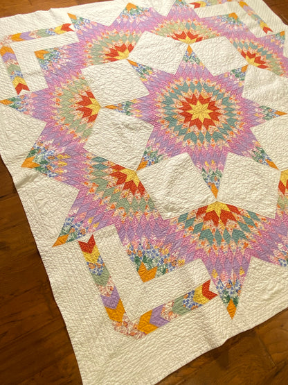 Unique Broken Star Quilt with Corner Framed Borders