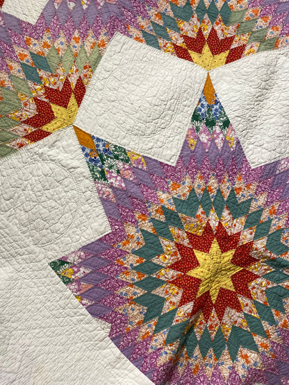 Unique Broken Star Quilt with Corner Framed Borders