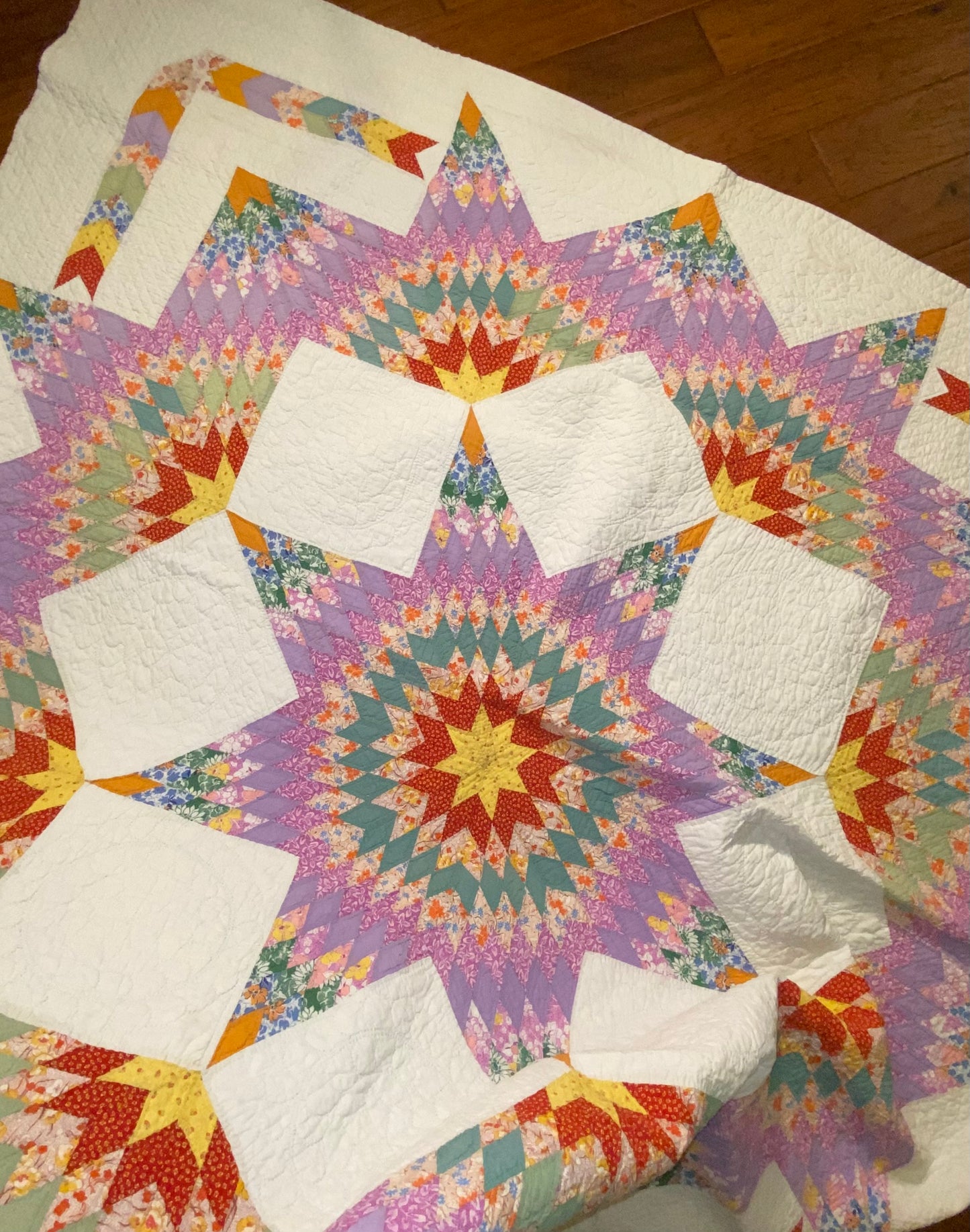 Unique Broken Star Quilt with Corner Framed Borders